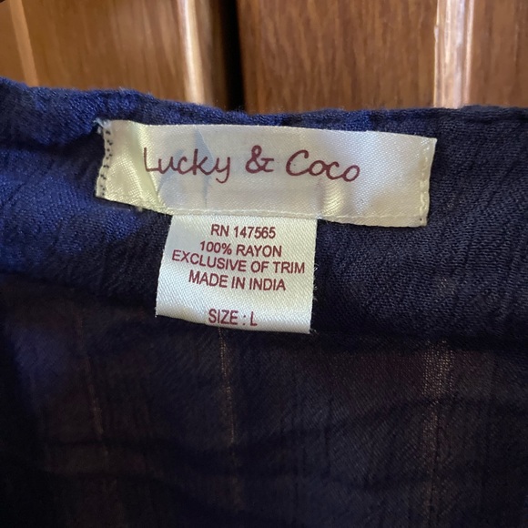 LUCKY & COCO Romper Rich blue with beautiful lace trim. Deep V neckline. - Picture 7 of 7